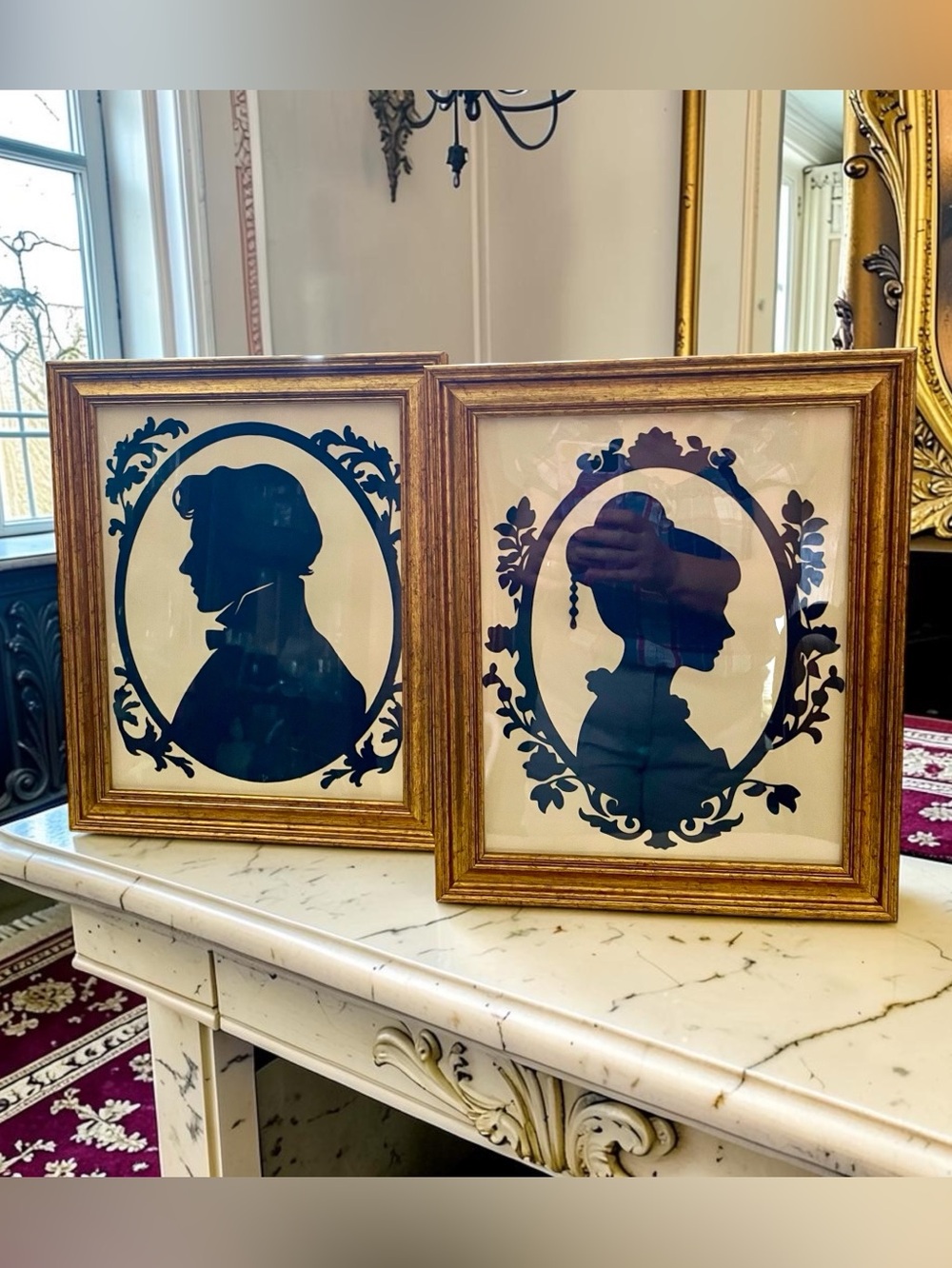 Pair of silhouettes, framed under acrylic, reminds me of Bridgerton